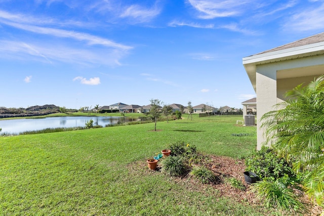 9213 Potomac Dr, Fort Pierce, FL 34945 - view of yard featuring a water view and central AC unit