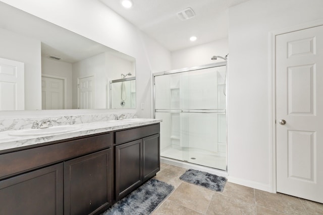9213 Potomac Dr, Fort Pierce, FL 34945 - bathroom featuring a stall shower, visible vents, and a sink