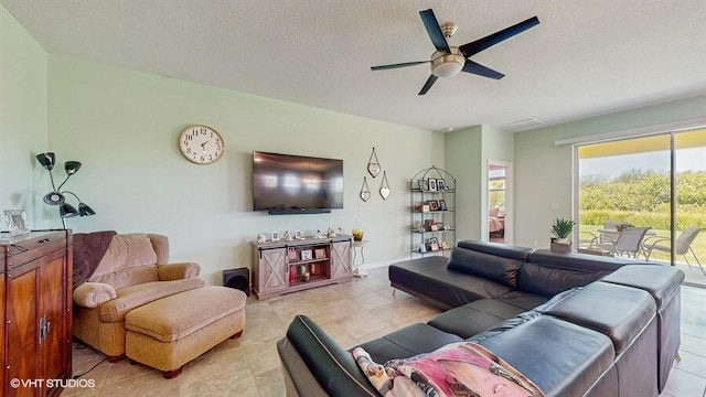 10577 SW Toren Way, Port Saint Lucie, FL 34987 - living room with a ceiling fan, a textured ceiling, and light tile patterned floors