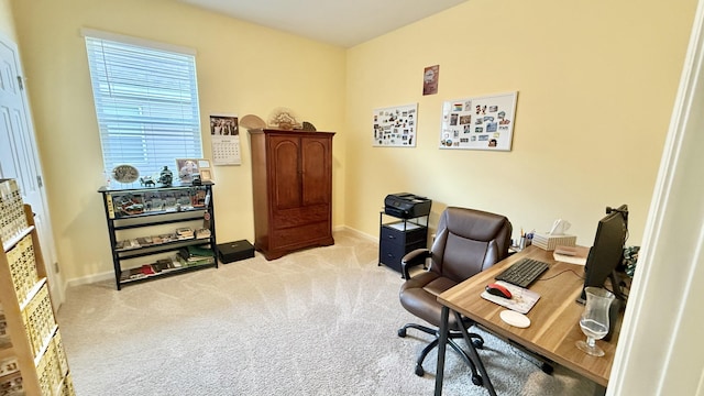 carpeted office with baseboards