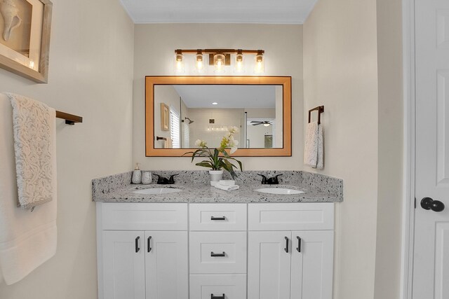 1701 SE Floresta Dr, Port Saint Lucie, FL 34983 - full bath featuring double vanity and a shower