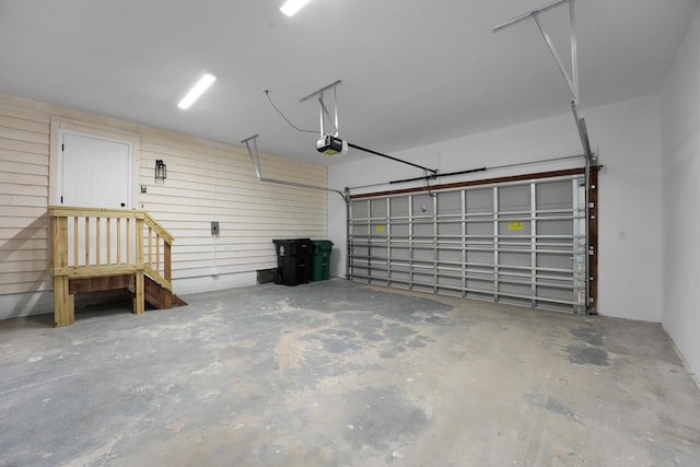 1701 SE Floresta Dr, Port Saint Lucie, FL 34983 - garage featuring a garage door opener