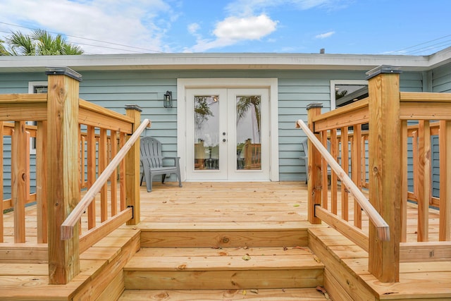 1701 SE Floresta Dr, Port Saint Lucie, FL 34983 - wooden terrace featuring french doors