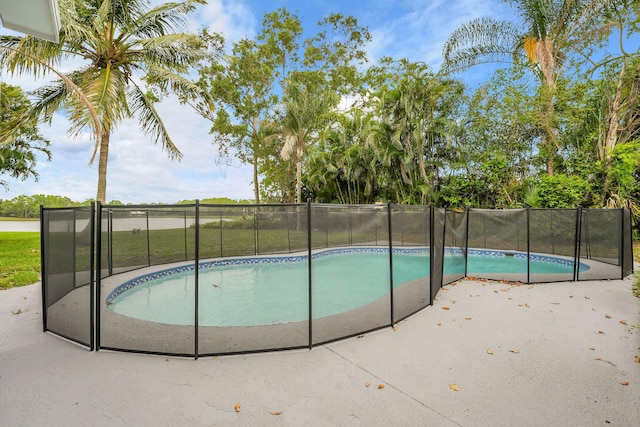1701 SE Floresta Dr, Port Saint Lucie, FL 34983 - view of swimming pool with a patio area