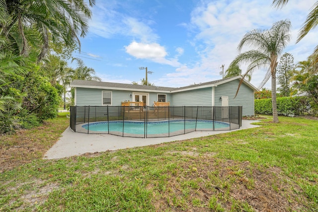 1701 SE Floresta Dr, Port Saint Lucie, FL 34983 - rear view of property featuring a patio area