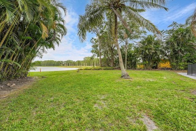 1701 SE Floresta Dr, Port Saint Lucie, FL 34983 - view of grassy yard with a water view