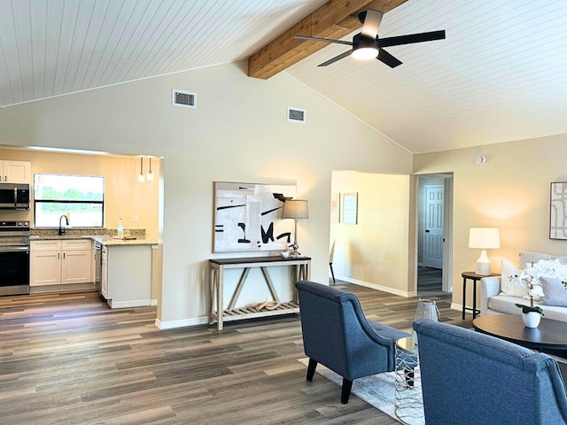 1701 SE Floresta Dr, Port Saint Lucie, FL 34983 - living area with dark wood finished floors, high vaulted ceiling, a ceiling fan, beamed ceiling, and baseboards