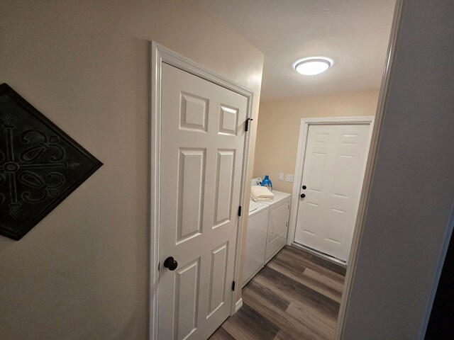 1701 SE Floresta Dr, Port Saint Lucie, FL 34983 - hall with independent washer and dryer and dark wood finished floors