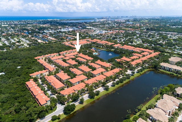 aerial view of property's location featuring a large body of water