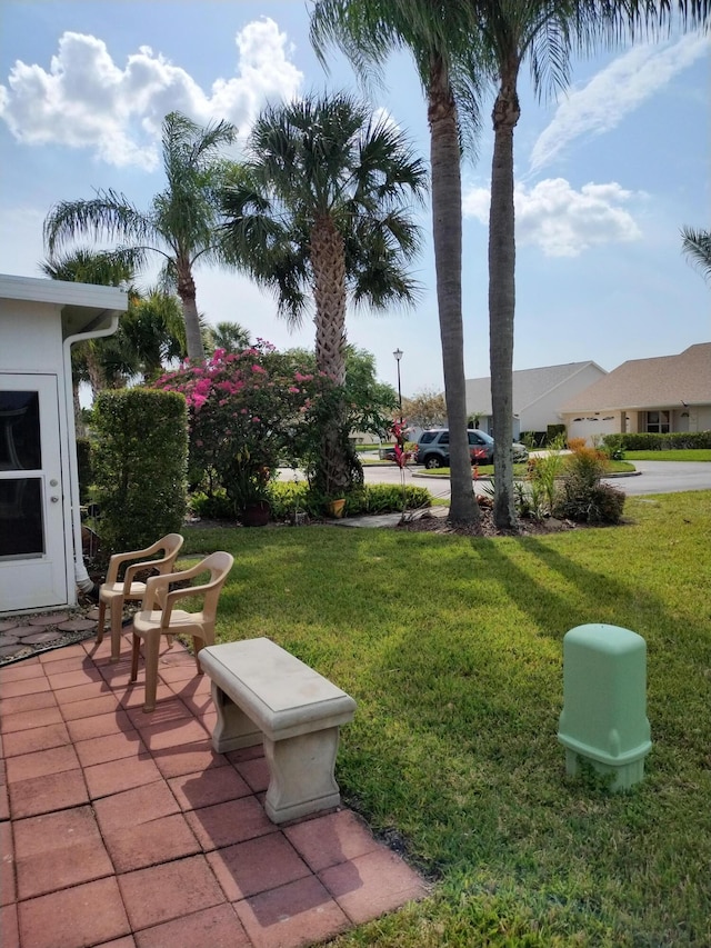 1047 NW Tuscany Dr, Port Saint Lucie, FL 34986 - view of yard with a patio