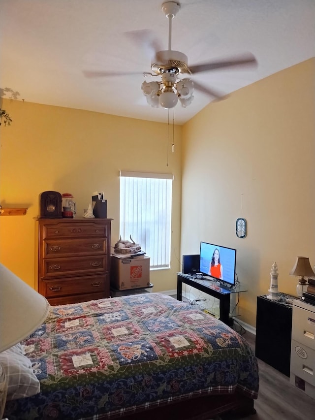 1047 NW Tuscany Dr, Port Saint Lucie, FL 34986 - bedroom with baseboards, wood finished floors, and a ceiling fan