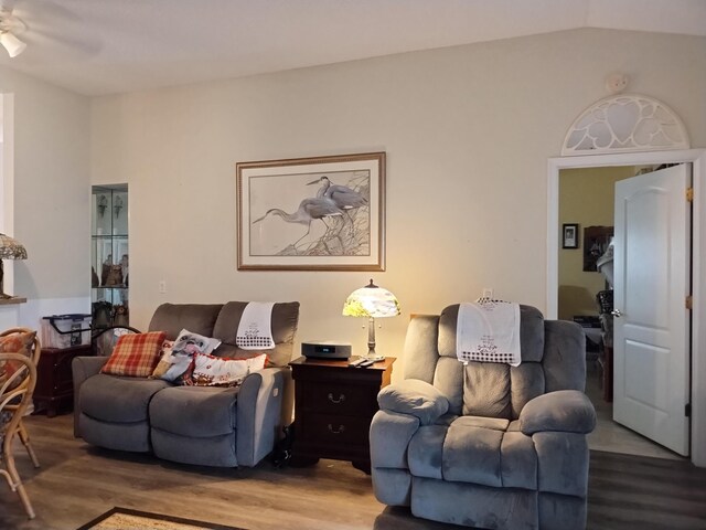 1047 NW Tuscany Dr, Port Saint Lucie, FL 34986 - living area with a ceiling fan, lofted ceiling, and wood finished floors