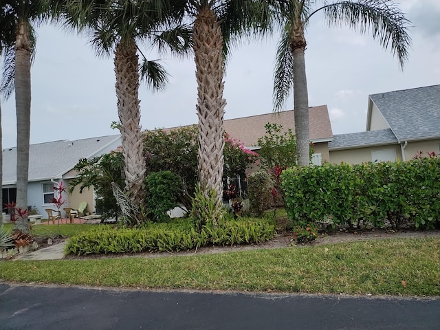 1047 NW Tuscany Dr, Port Saint Lucie, FL 34986 - view of side of property with stucco siding