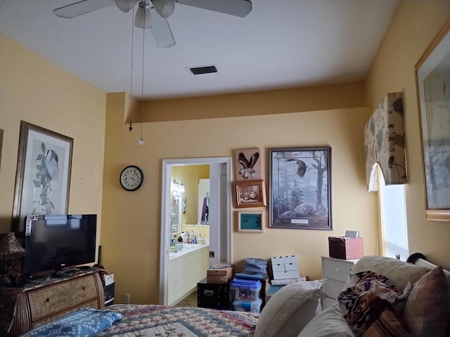 1047 NW Tuscany Dr, Port Saint Lucie, FL 34986 - bedroom with connected bathroom, visible vents, and ceiling fan