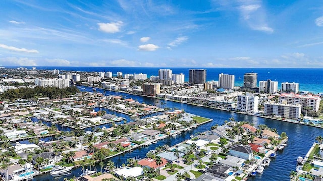 view of urban area featuring a large body of water