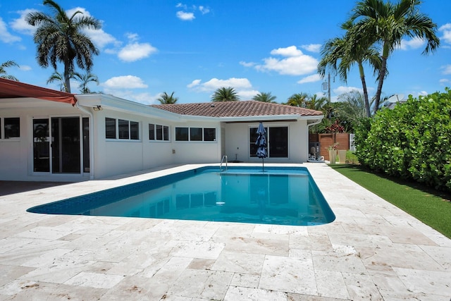outdoor pool featuring a patio area
