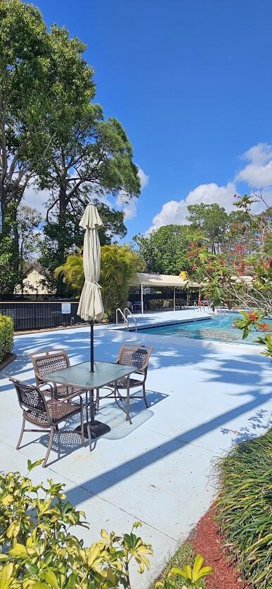 163 Pinto Palm Ct Unit 02, Royal Palm Beach, FL 33411 - view of pool with a patio area
