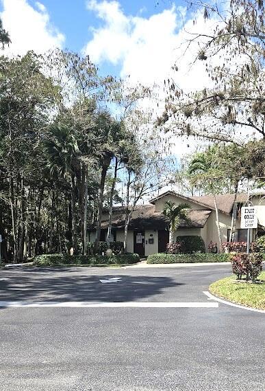 163 Pinto Palm Ct Unit 02, Royal Palm Beach, FL 33411 - view of front of property with stucco siding