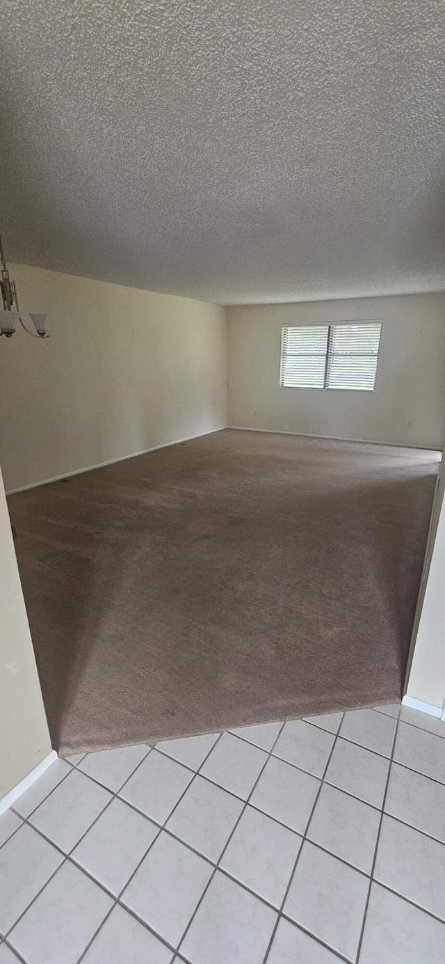 163 Pinto Palm Ct Unit 02, Royal Palm Beach, FL 33411 - unfurnished room with light colored carpet and a textured ceiling