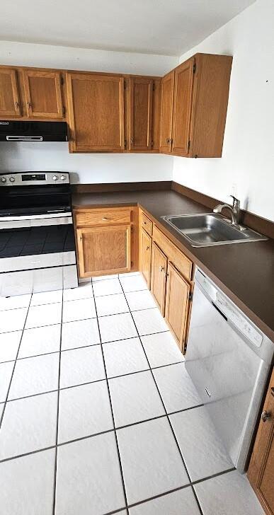 163 Pinto Palm Ct Unit 02, Royal Palm Beach, FL 33411 - kitchen featuring stainless steel electric range oven, white dishwasher, a sink, range hood, and light tile patterned floors