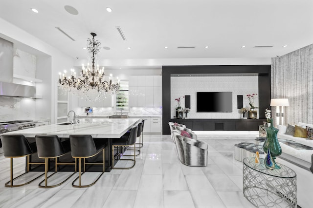 8388 Del Prado Dr, Delray Beach, FL 33446 - dining space with a chandelier and recessed lighting