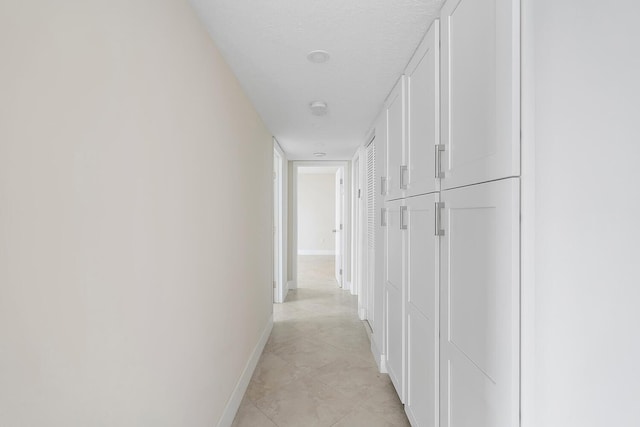 corridor with baseboards