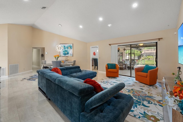 living area featuring high vaulted ceiling, baseboards, and visible vents