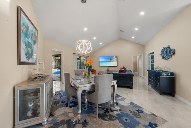 dining area featuring visible vents, baseboards, marble finish floor, lofted ceiling, and a notable chandelier