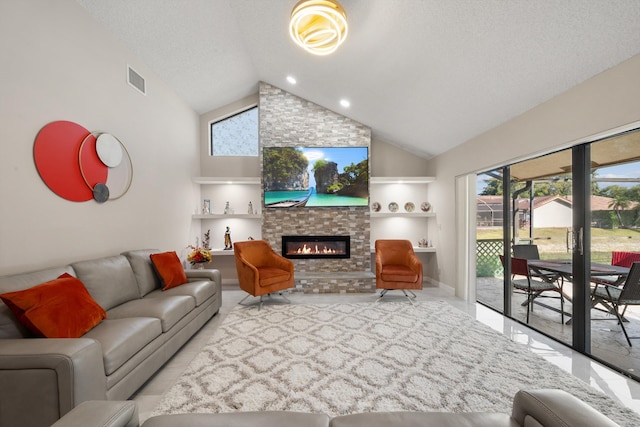 living room featuring high vaulted ceiling, a textured ceiling, visible vents, built in features, and a fireplace