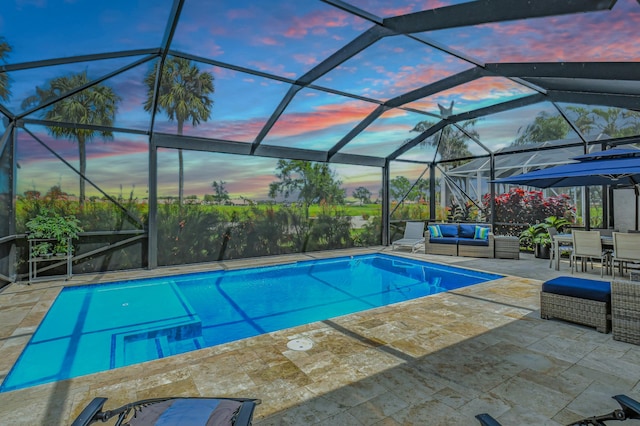 7199 Southport Dr, Boynton Beach, FL 33472 - pool with outdoor lounge area, glass enclosure, and a patio