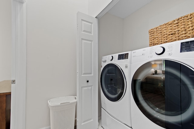 9448 Boca River Cir, Boca Raton, FL 33434 - laundry area with laundry area and separate washer and dryer
