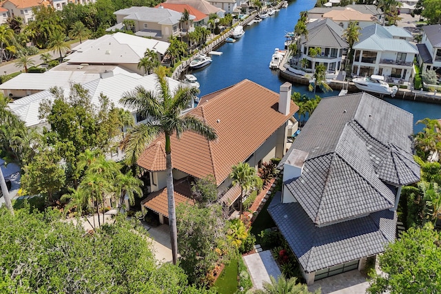 aerial view with a water view and a residential view