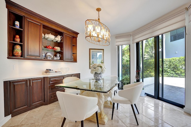 dining area with a chandelier