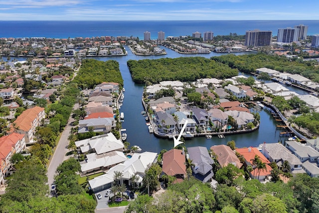 bird's eye view with a residential view and a water view