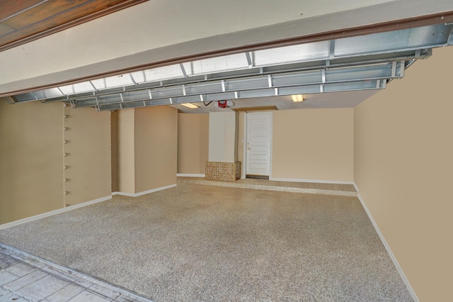 garage with baseboards