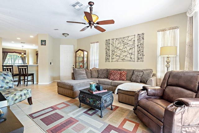 9686 SW Glenbrook Dr, Port Saint Lucie, FL 34987 - living area featuring recessed lighting, light tile patterned floors, baseboards, visible vents, and a ceiling fan