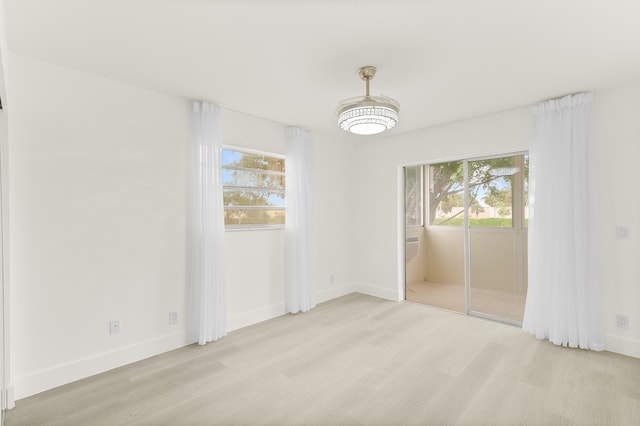 361 Normandy H, Delray Beach, FL 33484 - empty room with light wood-type flooring and baseboards