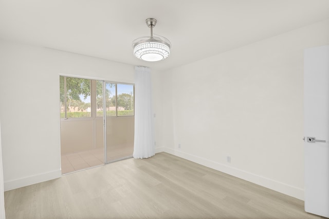 361 Normandy H, Delray Beach, FL 33484 - empty room featuring light wood finished floors and baseboards