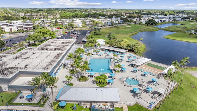 361 Normandy H, Delray Beach, FL 33484 - drone / aerial view of a pool, a nearby body of water, and a golf course