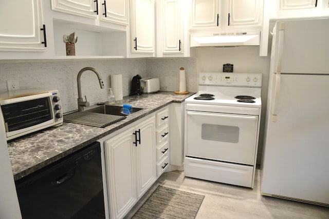 2841 Somerset Dr Unit 217, Lauderdale Lakes, FL 33311 - kitchen featuring white appliances, under cabinet range hood, a sink, and white cabinets