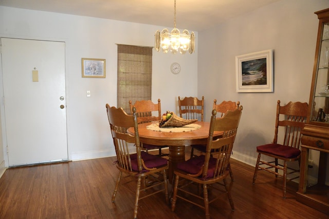 2841 Somerset Dr Unit 217, Lauderdale Lakes, FL 33311 - dining room with a chandelier, wood finished floors, and baseboards