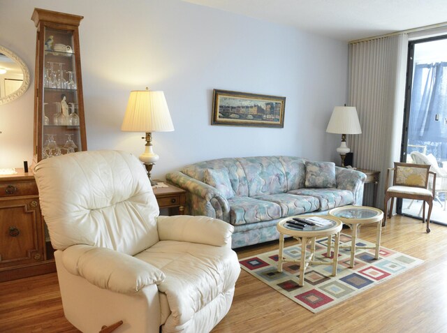 2841 Somerset Dr Unit 217, Lauderdale Lakes, FL 33311 - living area featuring wood finished floors