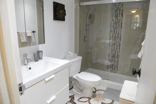 2841 Somerset Dr Unit 217, Lauderdale Lakes, FL 33311 - full bath with vanity, toilet, a shower stall, and tile patterned floors
