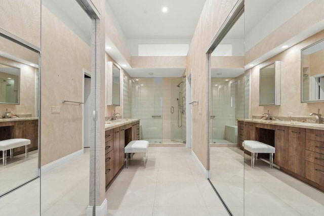 2437 NW 64th St, Boca Raton, FL 33496 - full bath featuring baseboards, tile patterned floors, a sink, a stall shower, and two vanities