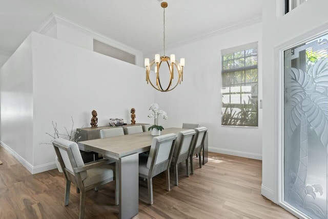 2437 NW 64th St, Boca Raton, FL 33496 - dining room featuring baseboards, an inviting chandelier, crown molding, and light wood finished floors