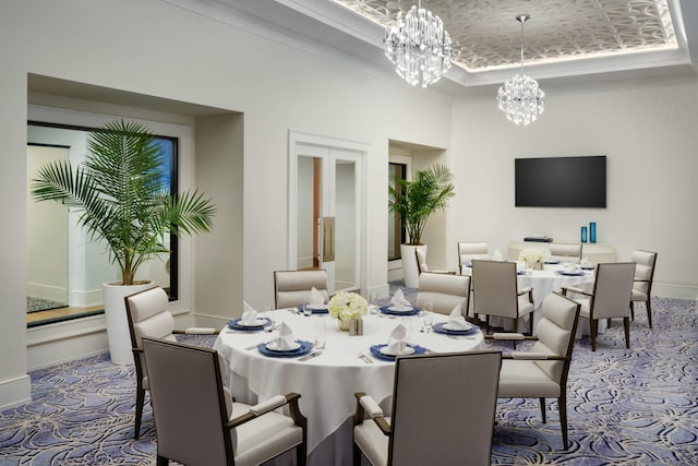 2437 NW 64th St, Boca Raton, FL 33496 - dining space with a notable chandelier, a tray ceiling, and baseboards