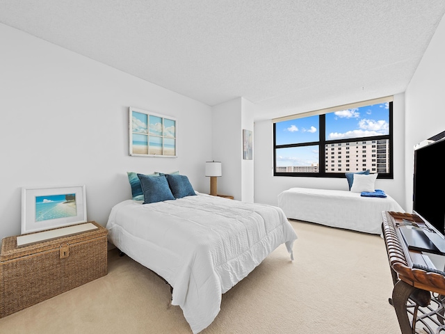 3450 S Ocean Blvd Unit 906, Highland Beach, FL 33487 - bedroom featuring carpet and a textured ceiling