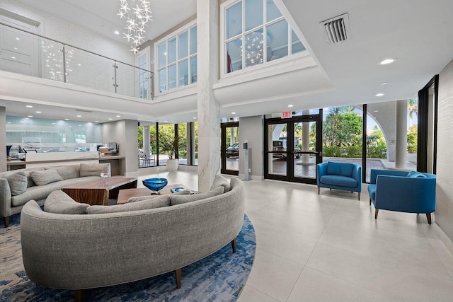 3450 S Ocean Blvd Unit 906, Highland Beach, FL 33487 - community lobby featuring a towering ceiling and recessed lighting