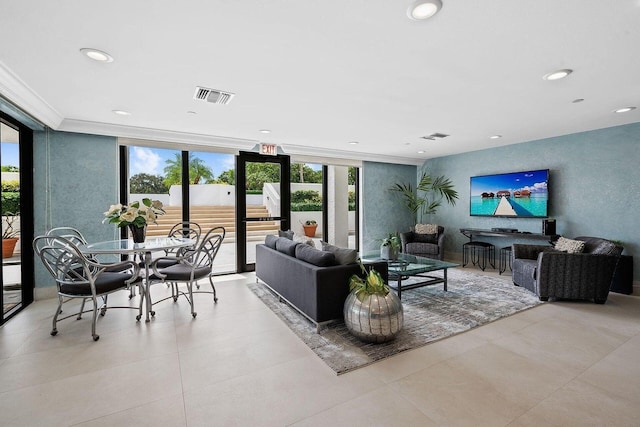3450 S Ocean Blvd Unit 906, Highland Beach, FL 33487 - living room with expansive windows, plenty of natural light, recessed lighting, and crown molding