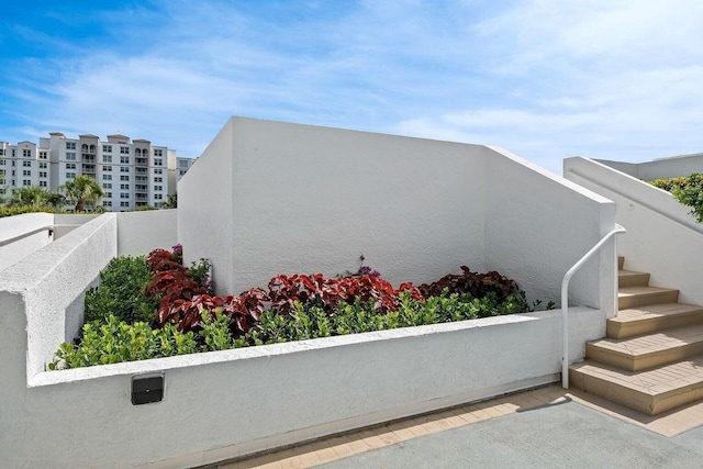 3450 S Ocean Blvd Unit 906, Highland Beach, FL 33487 - view of home's exterior featuring stucco siding